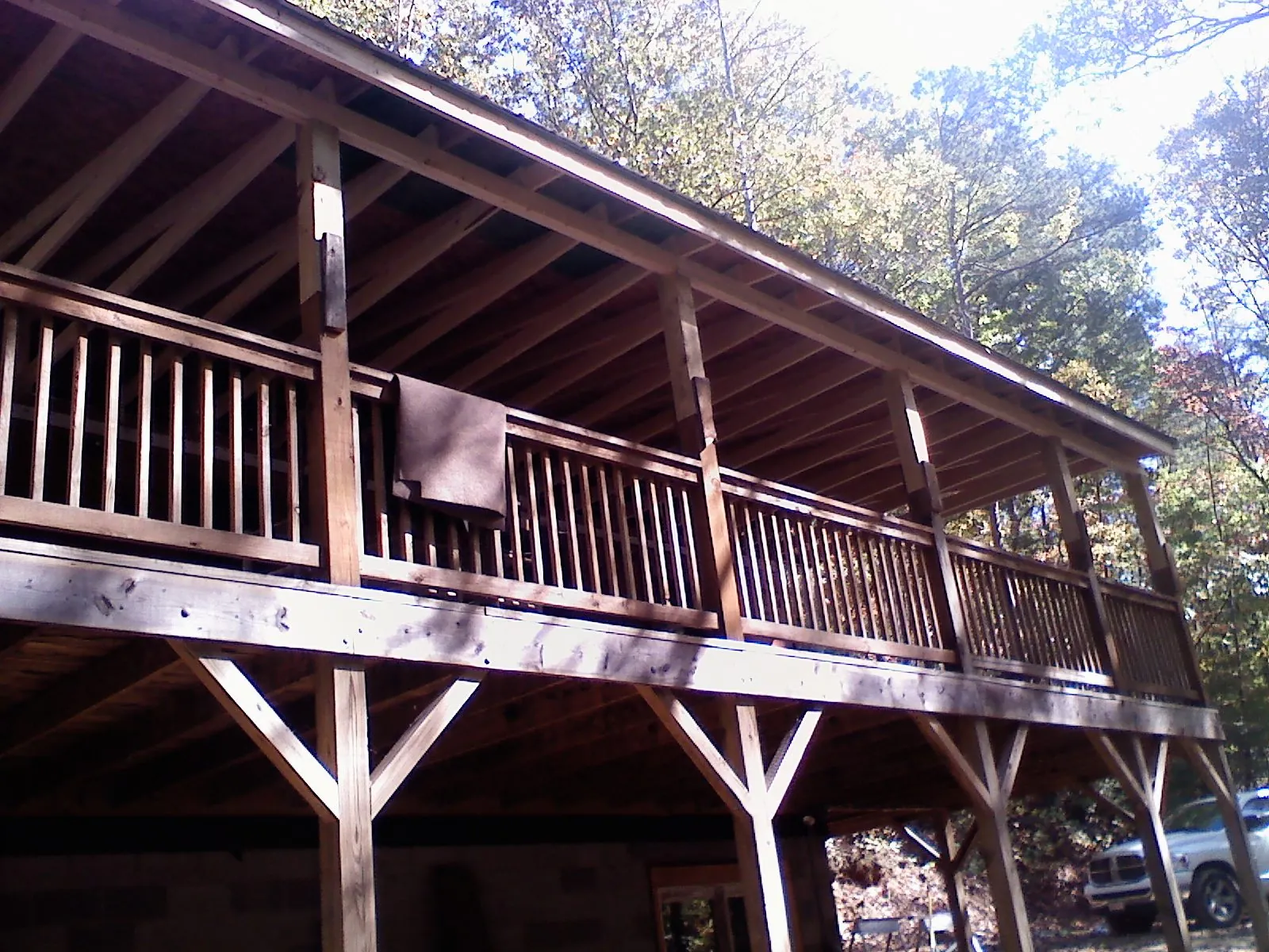 Timber framing under a new elevated porch and deck in Williams